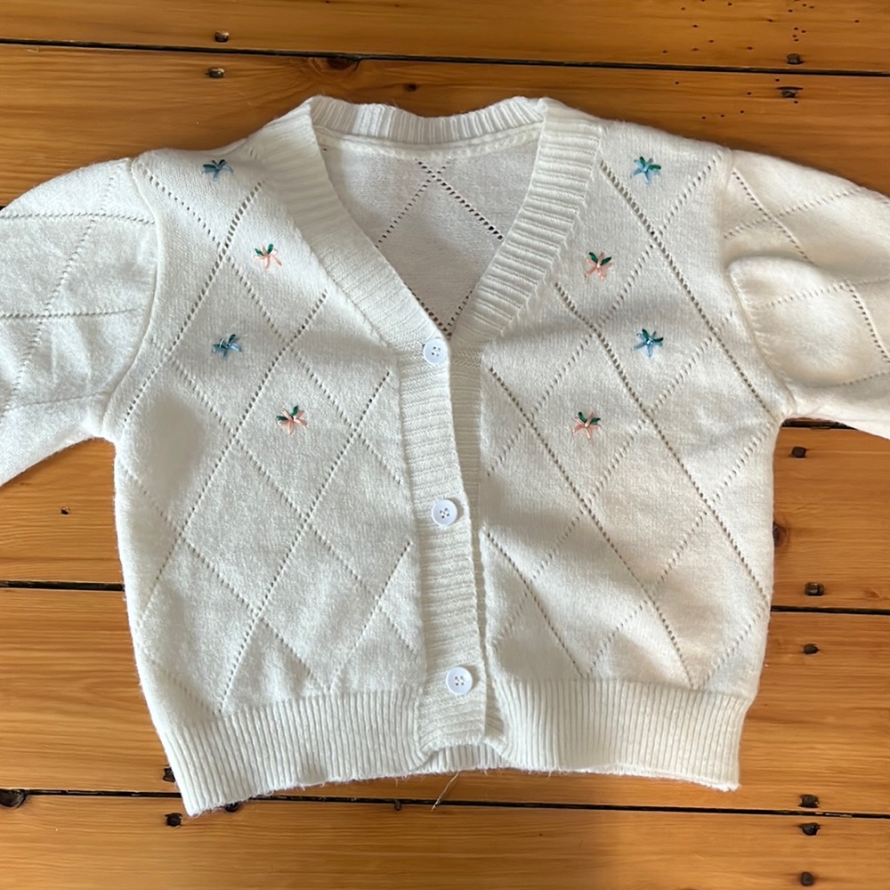 Cotton button up with Flower stitches.